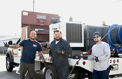 Cirigliano Plumbing crew standing in front of their work truck